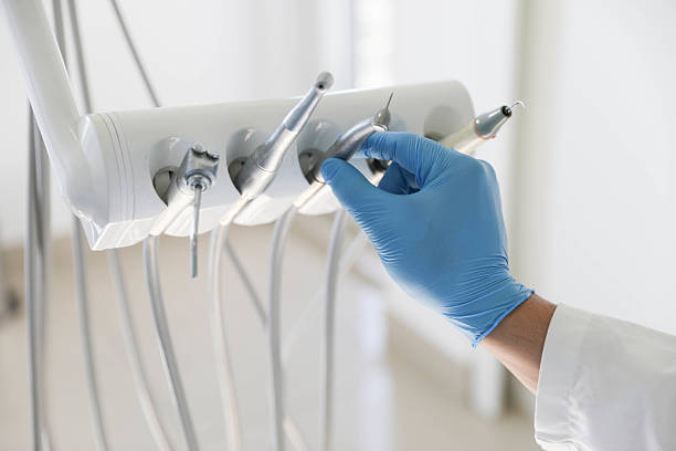 Professional Tooth Extraction technician working in Iron Mountain, MI